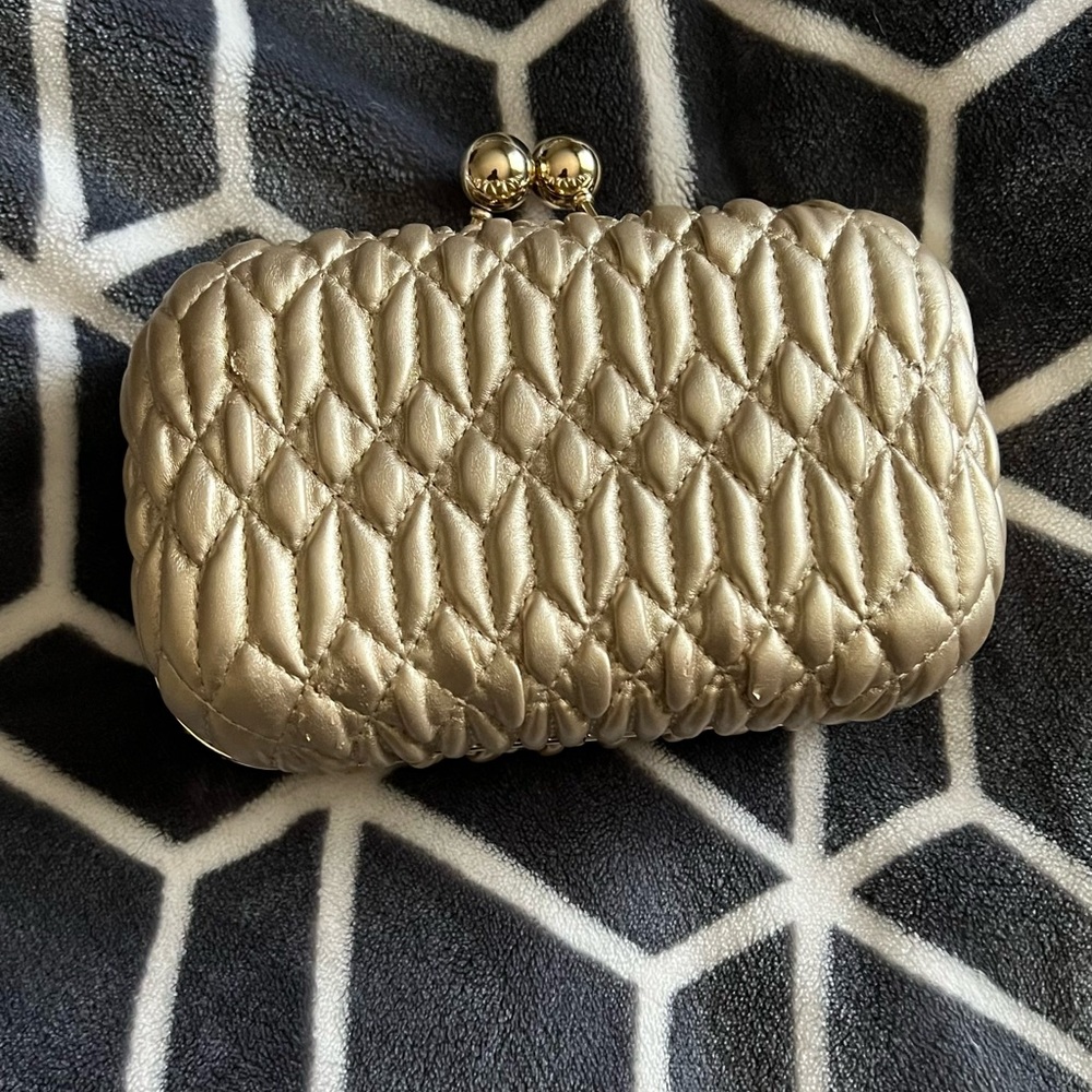 Gold clutch